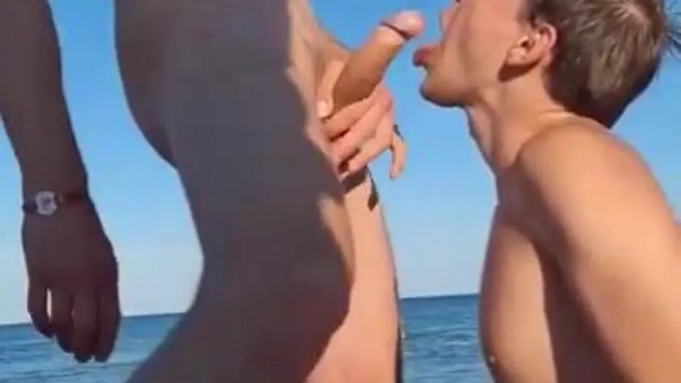 Twink cutie blow daddy cock on nude beach