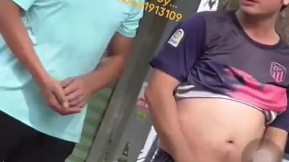 Two friends pissing in public together - ThisVid.com