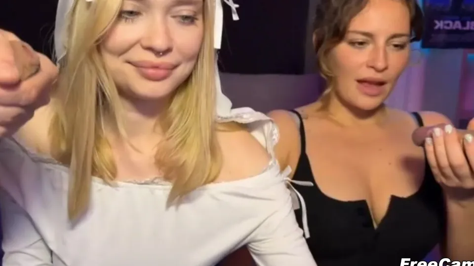 Two Slutty Babes Sucking Cock Side by Side