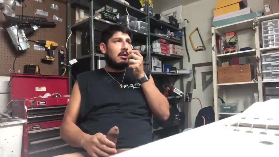Uncut latino jerking in his uncle's workshop - ThisVid.com
