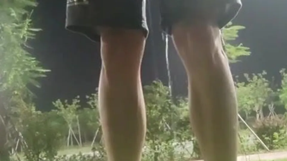 Wetting in Public on Grass - ThisVid.com