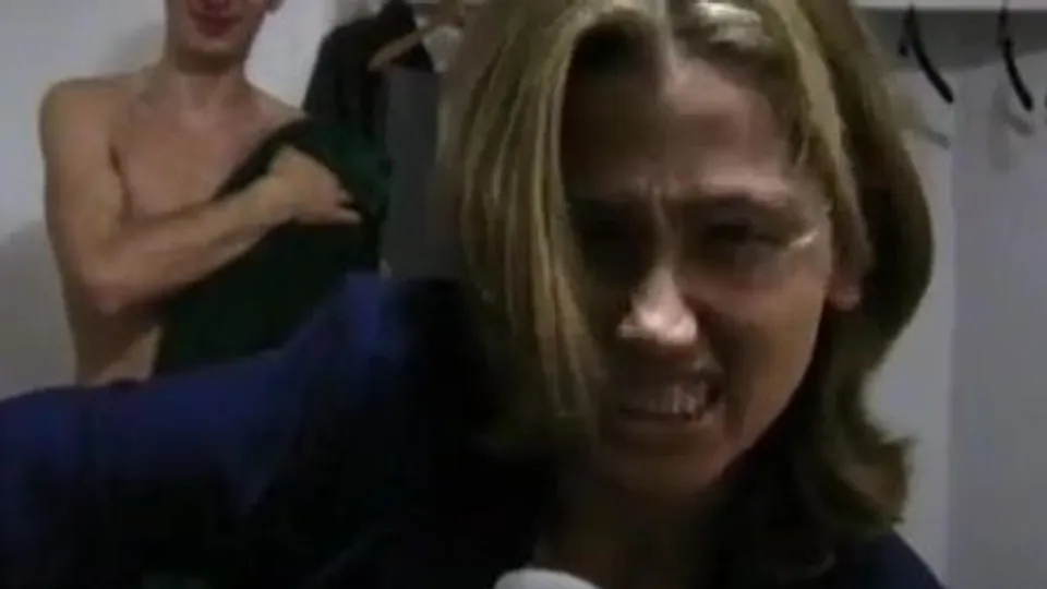 Woman reporter in mens locker room