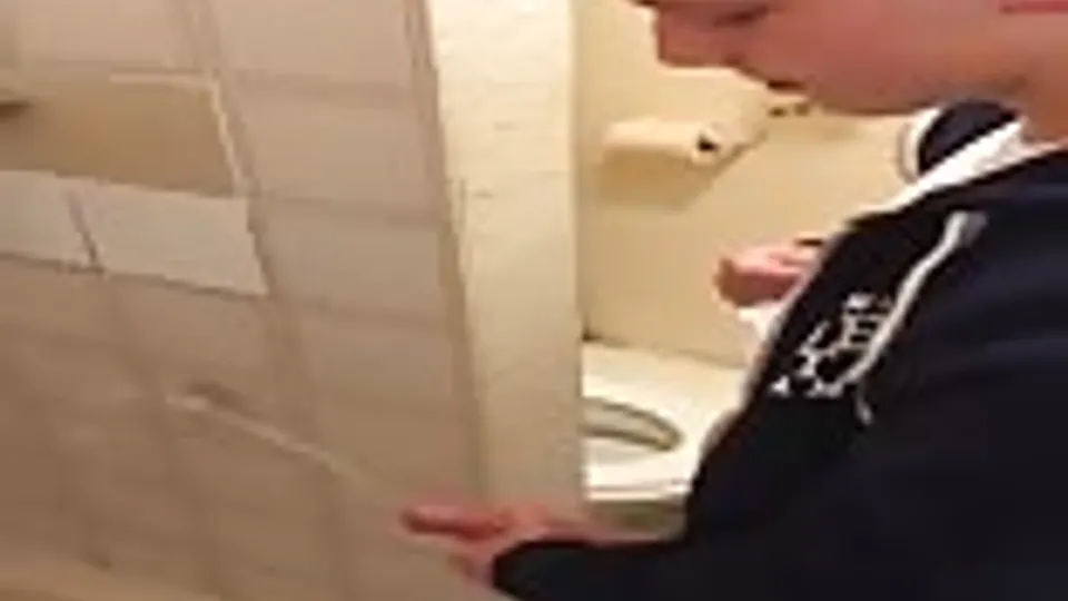 Young boy piss with full erection