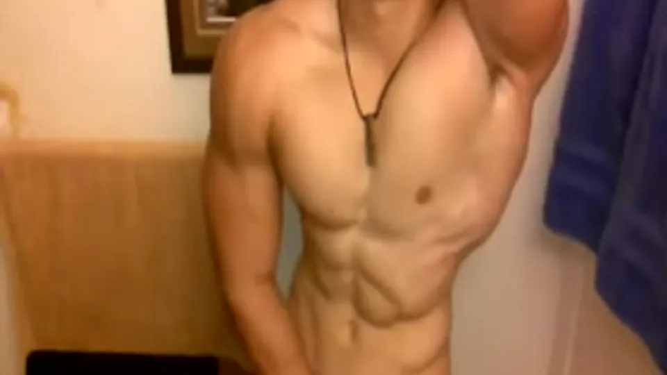 Young guy flexes