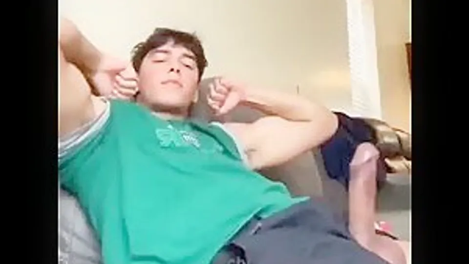 Young jock flexes his biceps with his big dick out