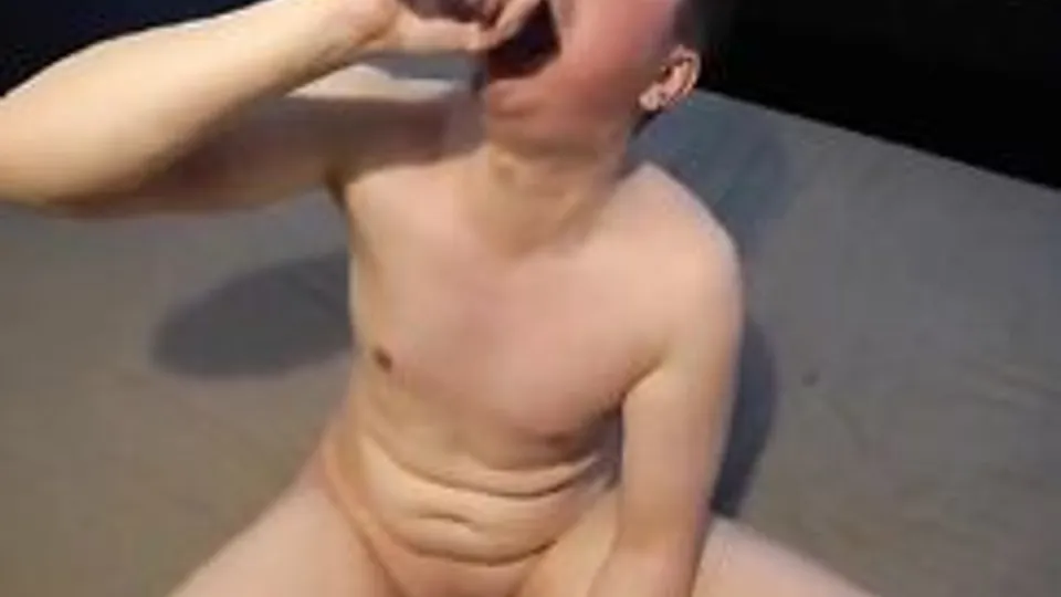 Young slut sucking dildo