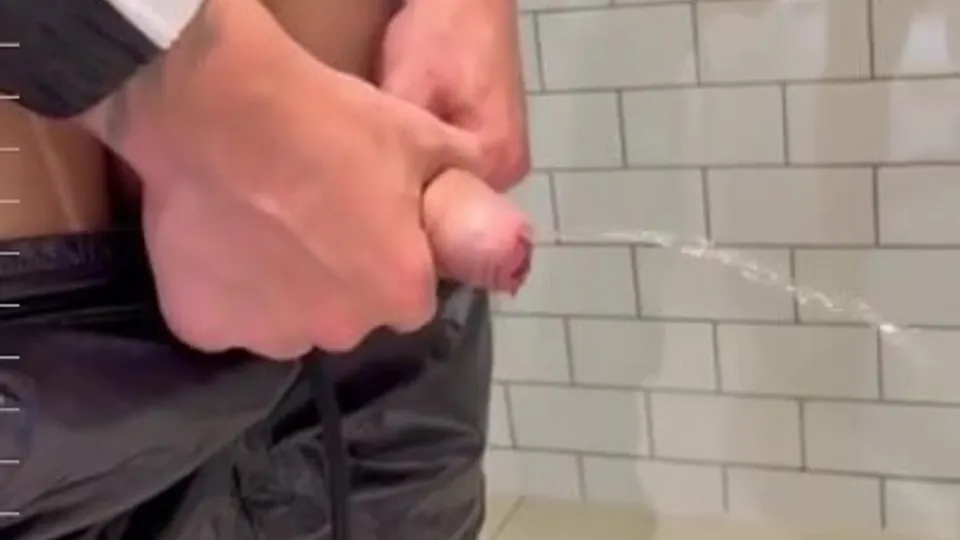 Young uncut guy pissing - ThisVid.com