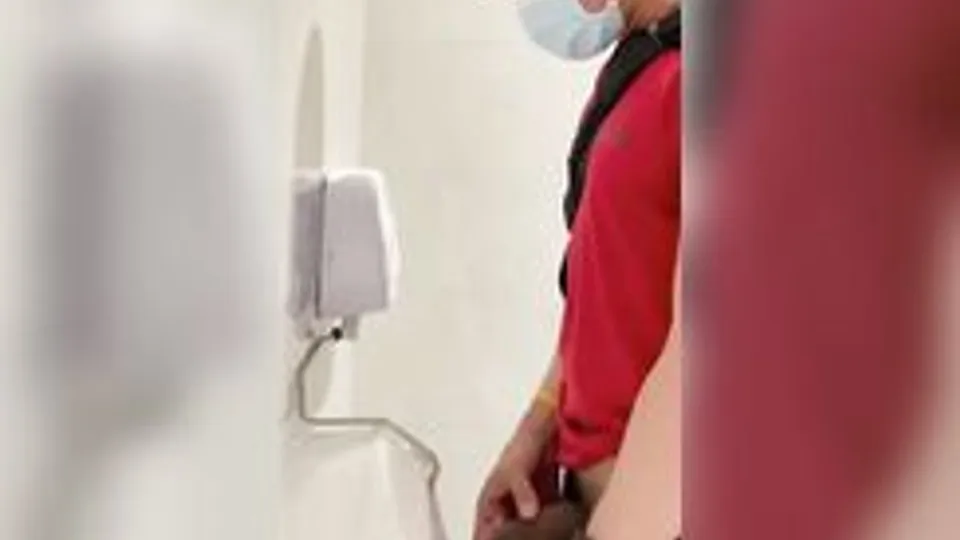 Young uncut urinal show off
